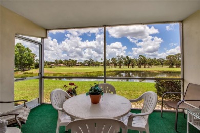 Enjoy your morning coffee and breakfast on your lanai while on University Park Country Club in Florida - for sale on GolfHomes.com, golf home, golf lot