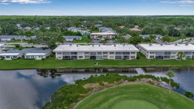 Enjoy your morning coffee and breakfast on your lanai while on University Park Country Club in Florida - for sale on GolfHomes.com, golf home, golf lot