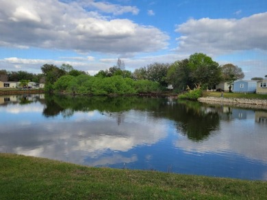 Awe inspiring views of the water and florida wildlife await you on Golden Lakes Golf Course in Florida - for sale on GolfHomes.com, golf home, golf lot