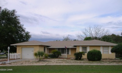 As one of the original sturdy concrete block homes that was on Sunny Hills Golf and Country Club in Florida - for sale on GolfHomes.com, golf home, golf lot