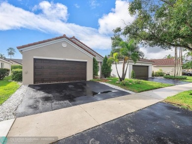 Rare opportunity to own this One-story home with 3 Bedrooms, 2 on Weston Hills Country Club in Florida - for sale on GolfHomes.com, golf home, golf lot