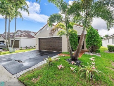 Rare opportunity to own this One-story home with 3 Bedrooms, 2 on Weston Hills Country Club in Florida - for sale on GolfHomes.com, golf home, golf lot