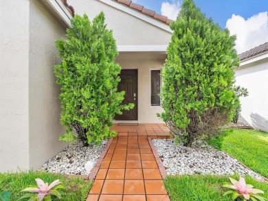 Rare opportunity to own this One-story home with 3 Bedrooms, 2 on Weston Hills Country Club in Florida - for sale on GolfHomes.com, golf home, golf lot