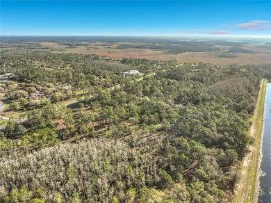 Come and build your dream home on this **2.88 Acres combined on Wedgefield Golf Club in Florida - for sale on GolfHomes.com, golf home, golf lot