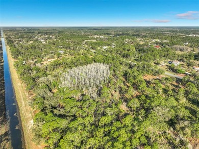Come and build your dream home on this **2.88 Acres combined on Wedgefield Golf Club in Florida - for sale on GolfHomes.com, golf home, golf lot
