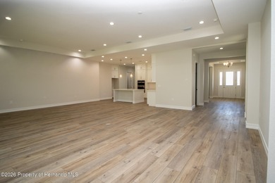 This beautiful semi-custom home by Spire Homes is set on a on Southern Hills Plantation Club in Florida - for sale on GolfHomes.com, golf home, golf lot