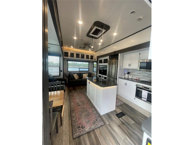 LAKEFRONT LIVING! RETIRE WITH CONFIDENCE!! Welcome to Kove on Cypress Point RV Golf Club in Florida - for sale on GolfHomes.com, golf home, golf lot