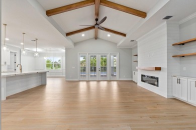 This stunning 2025 custom-built pool home presented by Southern on The Legacy Golf and Tennis Club in Florida - for sale on GolfHomes.com, golf home, golf lot