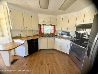 Furnished Corner Lot in the Beautiful Brookridge Community This on Brookridge Country Club in Florida - for sale on GolfHomes.com, golf home, golf lot