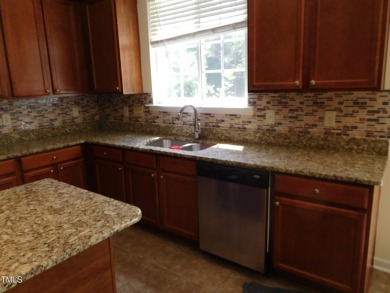 This well-maintained home is perfectly situated on a quiet on Eagle Ridge Golf Course in North Carolina - for sale on GolfHomes.com, golf home, golf lot