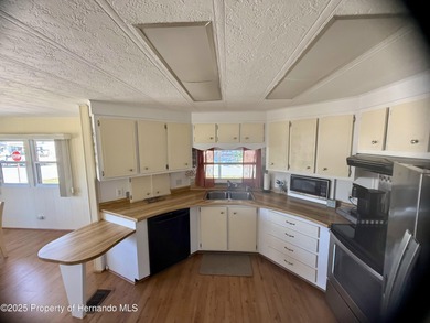 Furnished Corner Lot in the Beautiful Brookridge Community This on Brookridge Country Club in Florida - for sale on GolfHomes.com, golf home, golf lot