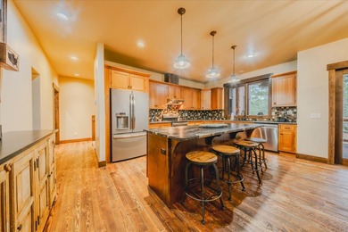 Discover a proven income-producing retreat, perfectly positioned on Wilderness Club in Montana - for sale on GolfHomes.com, golf home, golf lot