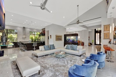 Welcome to waterfront living, in prestigious Frenchman's Creek on Frenchmans Creek Country Club in Florida - for sale on GolfHomes.com, golf home, golf lot