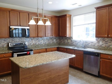 This well-maintained home is perfectly situated on a quiet on Eagle Ridge Golf Course in North Carolina - for sale on GolfHomes.com, golf home, golf lot
