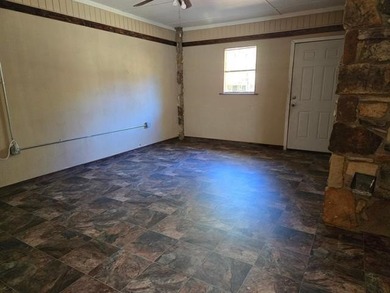 Welcome home to this inviting 3-bedroom, all-electric property on Cherokee Village South Course in Arkansas - for sale on GolfHomes.com, golf home, golf lot