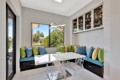 Welcome to waterfront living, in prestigious Frenchman's Creek on Frenchmans Creek Country Club in Florida - for sale on GolfHomes.com, golf home, golf lot