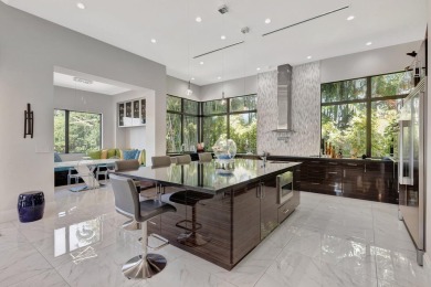 Welcome to waterfront living, in prestigious Frenchman's Creek on Frenchmans Creek Country Club in Florida - for sale on GolfHomes.com, golf home, golf lot