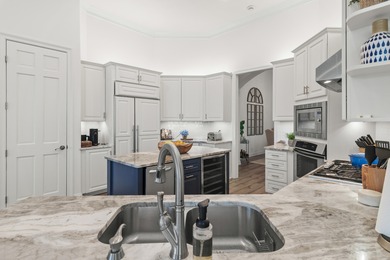 Welcome to 511 Regatta Bay Blvd., an exceptional residence on Regatta Bay Golf and Country Club in Florida - for sale on GolfHomes.com, golf home, golf lot