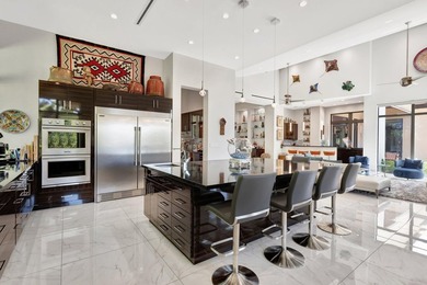 Welcome to waterfront living, in prestigious Frenchman's Creek on Frenchmans Creek Country Club in Florida - for sale on GolfHomes.com, golf home, golf lot