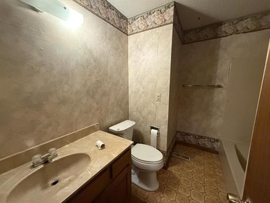 Welcome home to this inviting 3-bedroom, all-electric property on Cherokee Village South Course in Arkansas - for sale on GolfHomes.com, golf home, golf lot