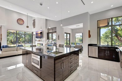 Welcome to waterfront living, in prestigious Frenchman's Creek on Frenchmans Creek Country Club in Florida - for sale on GolfHomes.com, golf home, golf lot