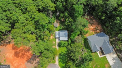 Nestled in the desirable Turtle Cove subdivision, this charming on Turtle Cove Golf Course in Georgia - for sale on GolfHomes.com, golf home, golf lot