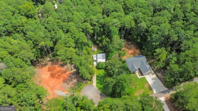 Nestled in the desirable Turtle Cove subdivision, this charming on Turtle Cove Golf Course in Georgia - for sale on GolfHomes.com, golf home, golf lot