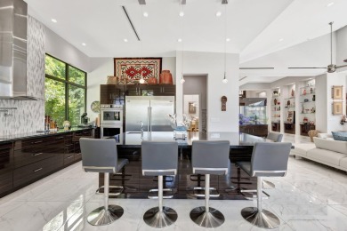 Welcome to waterfront living, in prestigious Frenchman's Creek on Frenchmans Creek Country Club in Florida - for sale on GolfHomes.com, golf home, golf lot