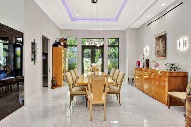 Welcome to waterfront living, in prestigious Frenchman's Creek on Frenchmans Creek Country Club in Florida - for sale on GolfHomes.com, golf home, golf lot