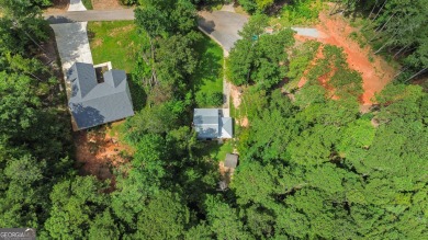 Nestled in the desirable Turtle Cove subdivision, this charming on Turtle Cove Golf Course in Georgia - for sale on GolfHomes.com, golf home, golf lot