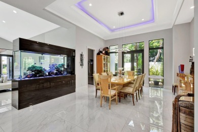Welcome to waterfront living, in prestigious Frenchman's Creek on Frenchmans Creek Country Club in Florida - for sale on GolfHomes.com, golf home, golf lot