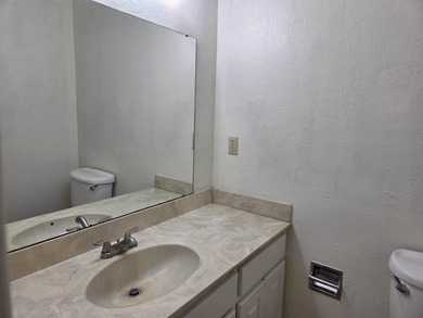 Welcome home to this inviting 3-bedroom, all-electric property on Cherokee Village South Course in Arkansas - for sale on GolfHomes.com, golf home, golf lot