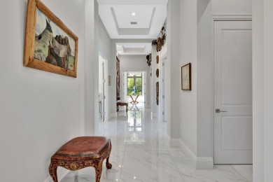 Welcome to waterfront living, in prestigious Frenchman's Creek on Frenchmans Creek Country Club in Florida - for sale on GolfHomes.com, golf home, golf lot