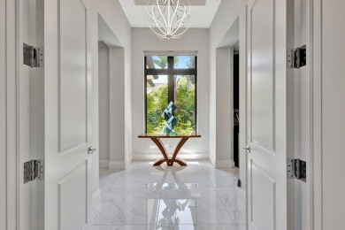 Welcome to waterfront living, in prestigious Frenchman's Creek on Frenchmans Creek Country Club in Florida - for sale on GolfHomes.com, golf home, golf lot