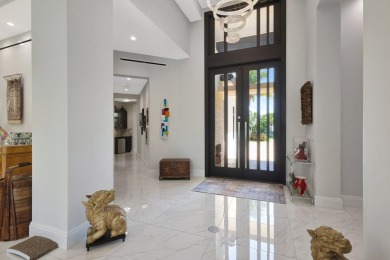 Welcome to waterfront living, in prestigious Frenchman's Creek on Frenchmans Creek Country Club in Florida - for sale on GolfHomes.com, golf home, golf lot