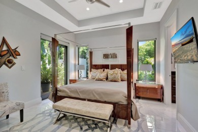 Welcome to waterfront living, in prestigious Frenchman's Creek on Frenchmans Creek Country Club in Florida - for sale on GolfHomes.com, golf home, golf lot