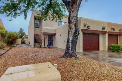 Desirable neighborhood with passive solar townhomes.  This home on Arroyo Del Oso Golf Course in New Mexico - for sale on GolfHomes.com, golf home, golf lot