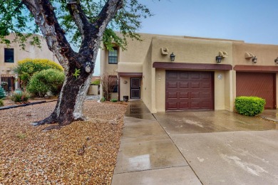 Desirable neighborhood with passive solar townhomes.  This home on Arroyo Del Oso Golf Course in New Mexico - for sale on GolfHomes.com, golf home, golf lot