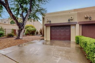 Desirable neighborhood with passive solar townhomes.  This home on Arroyo Del Oso Golf Course in New Mexico - for sale on GolfHomes.com, golf home, golf lot