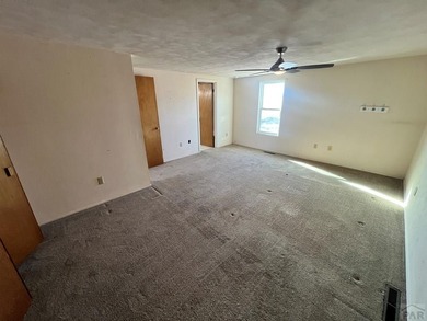 Excellent location and awesome views of the Greenhorn mountain on Hollydot Golf Course in Colorado - for sale on GolfHomes.com, golf home, golf lot