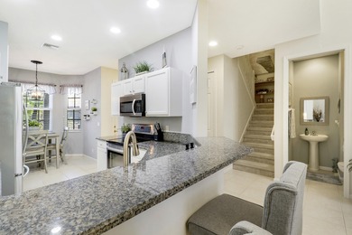 ENJOY GOLF VIEWS FROM THIS NICELY UPDATED TOWNHOUSE IN THE on The Legacy Golf and Tennis Club in Florida - for sale on GolfHomes.com, golf home, golf lot