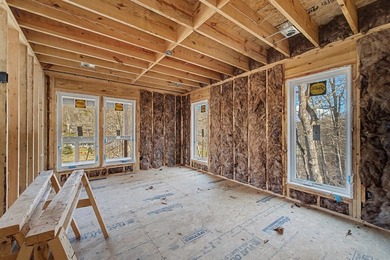 Wake up to mountain views and golf course scenery in this on Mill Creek Country Club in North Carolina - for sale on GolfHomes.com, golf home, golf lot