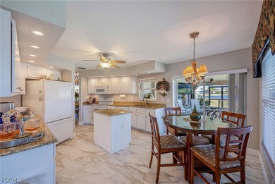 Experience the ultimate Florida lifestyle in this meticulously on Royal Tee Country Club in Florida - for sale on GolfHomes.com, golf home, golf lot