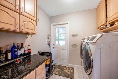 Experience the ultimate Florida lifestyle in this meticulously on Royal Tee Country Club in Florida - for sale on GolfHomes.com, golf home, golf lot