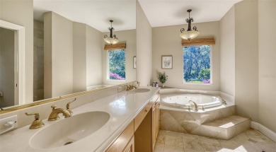 Welcome to this exceptional five-bedroom, five-and-a-half-bath on Laurel Oak Country Club in Florida - for sale on GolfHomes.com, golf home, golf lot