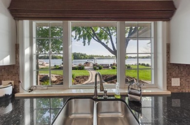 Stunning Waterfront Oasis on Lake Lancer! Welcome to your dream on Lakeside Golf Course in Michigan - for sale on GolfHomes.com, golf home, golf lot