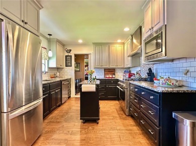 Welcome to this beautifully updated 4 bedroom, 3 full bath 1960s on Oso Beach Municipal Golf Course in Texas - for sale on GolfHomes.com, golf home, golf lot