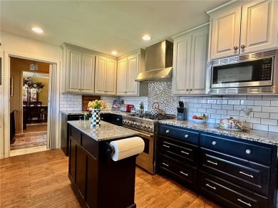 Welcome to this beautifully updated 4 bedroom, 3 full bath 1960s on Oso Beach Municipal Golf Course in Texas - for sale on GolfHomes.com, golf home, golf lot
