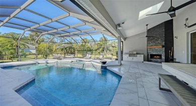 Welcome to this exceptional five-bedroom, five-and-a-half-bath on Laurel Oak Country Club in Florida - for sale on GolfHomes.com, golf home, golf lot