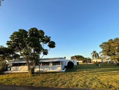 Three bedroom, Two bath with lots of space inside and out, Just on Cypress Creek Country Club - Boynton Beach in Florida - for sale on GolfHomes.com, golf home, golf lot